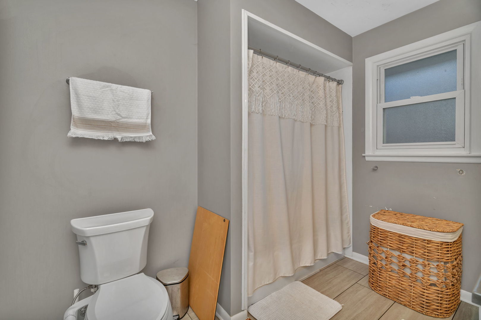 4217 Main Street Downers Grove, IL 60515 - Photo 11 of 31 a bathroom with a toilet and a shower