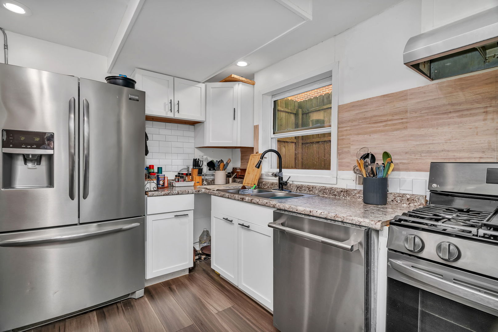 4217 Main Street Downers Grove, IL 60515 - Photo 21 of 31 a kitchen with a refrigerator stove and sink