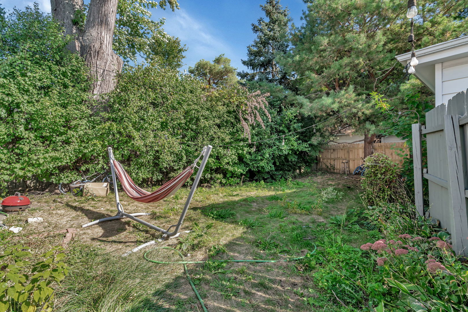 4217 Main Street Downers Grove, IL 60515 - Photo 25 of 31 a view of a chair and table in the garden