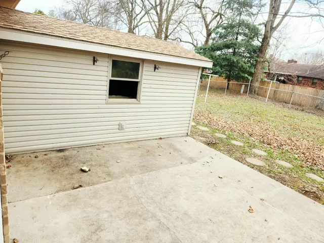 a view of backyard of house