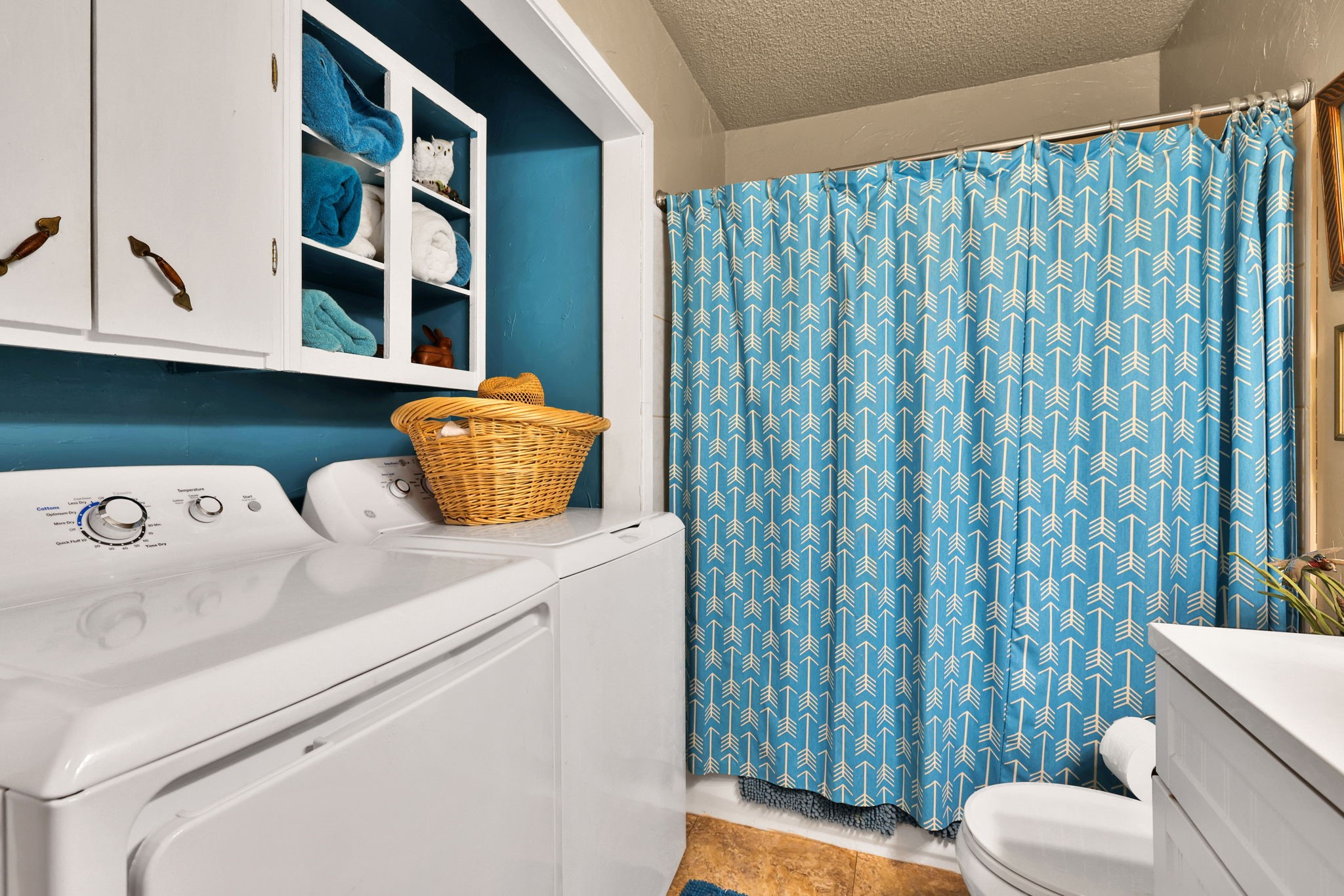 300 Timber Lane Coldspring, TX 77331 - Photo 21 of 43 Adjacent bath to the primary bedroom accommodates the laundry area as well