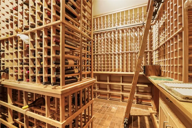 a view of a balcony with wooden floor and a sink