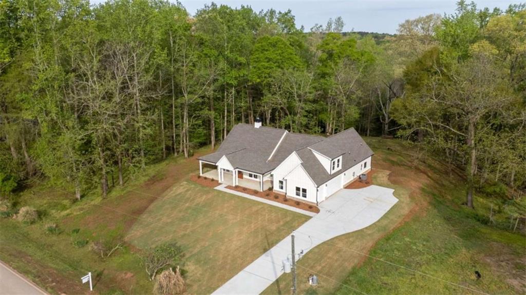 11691 Hazelbrand Road Northeast Covington, GA 30014 - Photo 53 of 53 view of a house with a yard