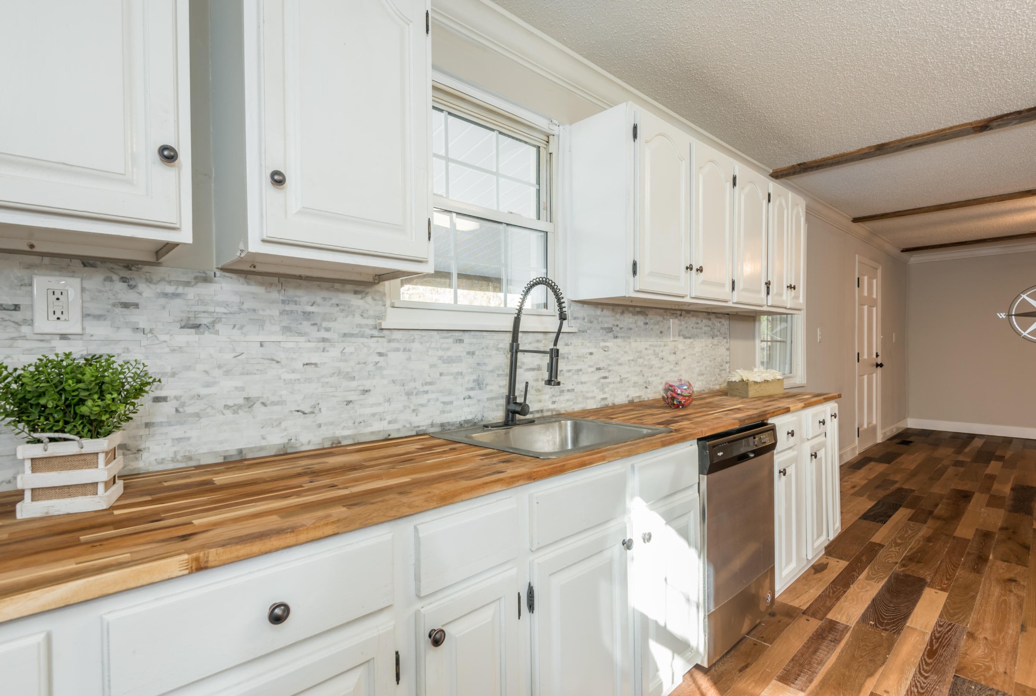 9825 Chestnut Ridge Road Heiskell, TN 37754 - Photo 10 of 32 a kitchen with stainless steel appliances granite countertop a sink stove and cabinets