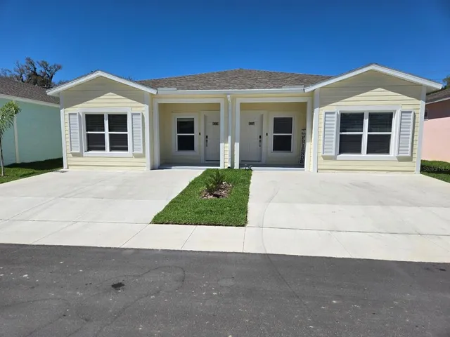 front view of a house and a yard