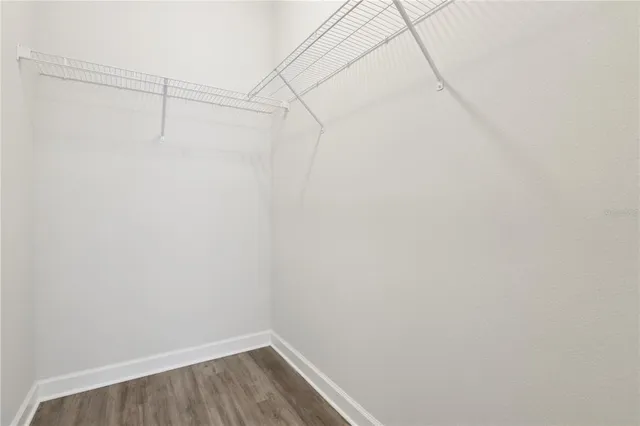 a view of a room with racks on the wall