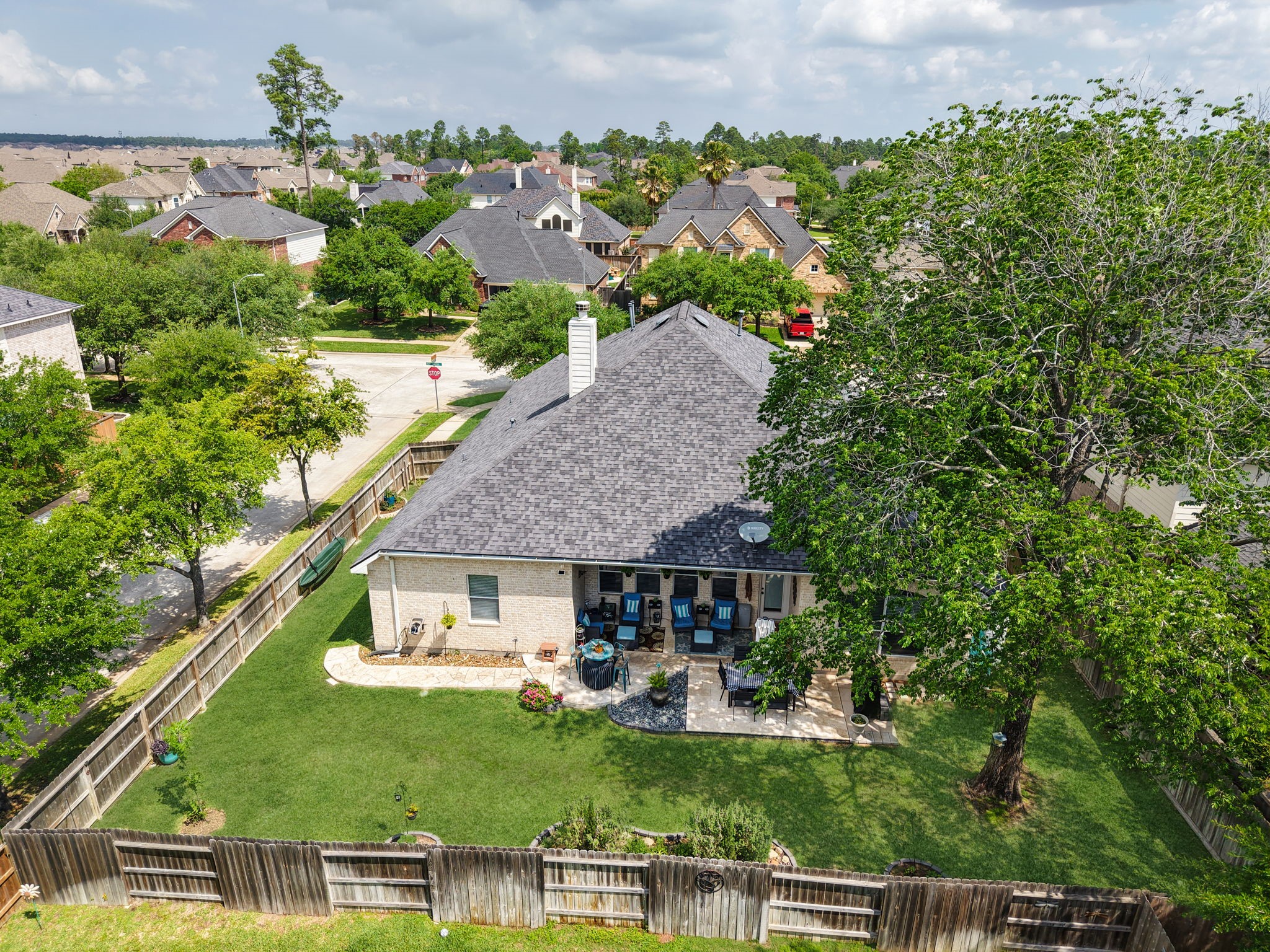 20410 Misty Crossing Lane Spring, TX 77379 - Photo 3 of 50 Drone view of the home and lot.