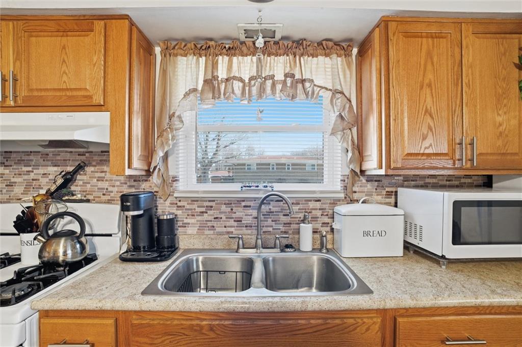 908 15th Street Elizabeth, PA 15037 - Photo 12 of 47 a kitchen with sink cabinets and window