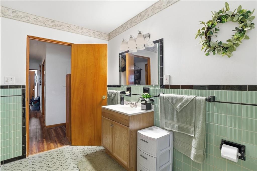 908 15th Street Elizabeth, PA 15037 - Photo 25 of 47 a bathroom with a sink mirror and vanity
