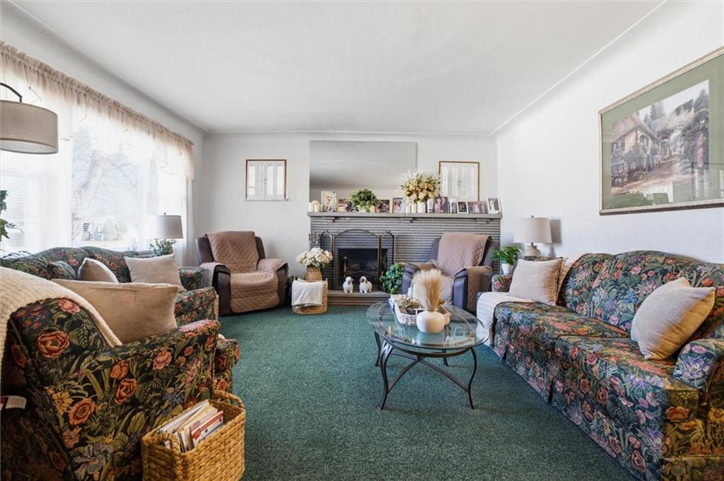 908 15th Street Elizabeth, PA 15037 - Photo 6 of 47 a living room with furniture and a fireplace