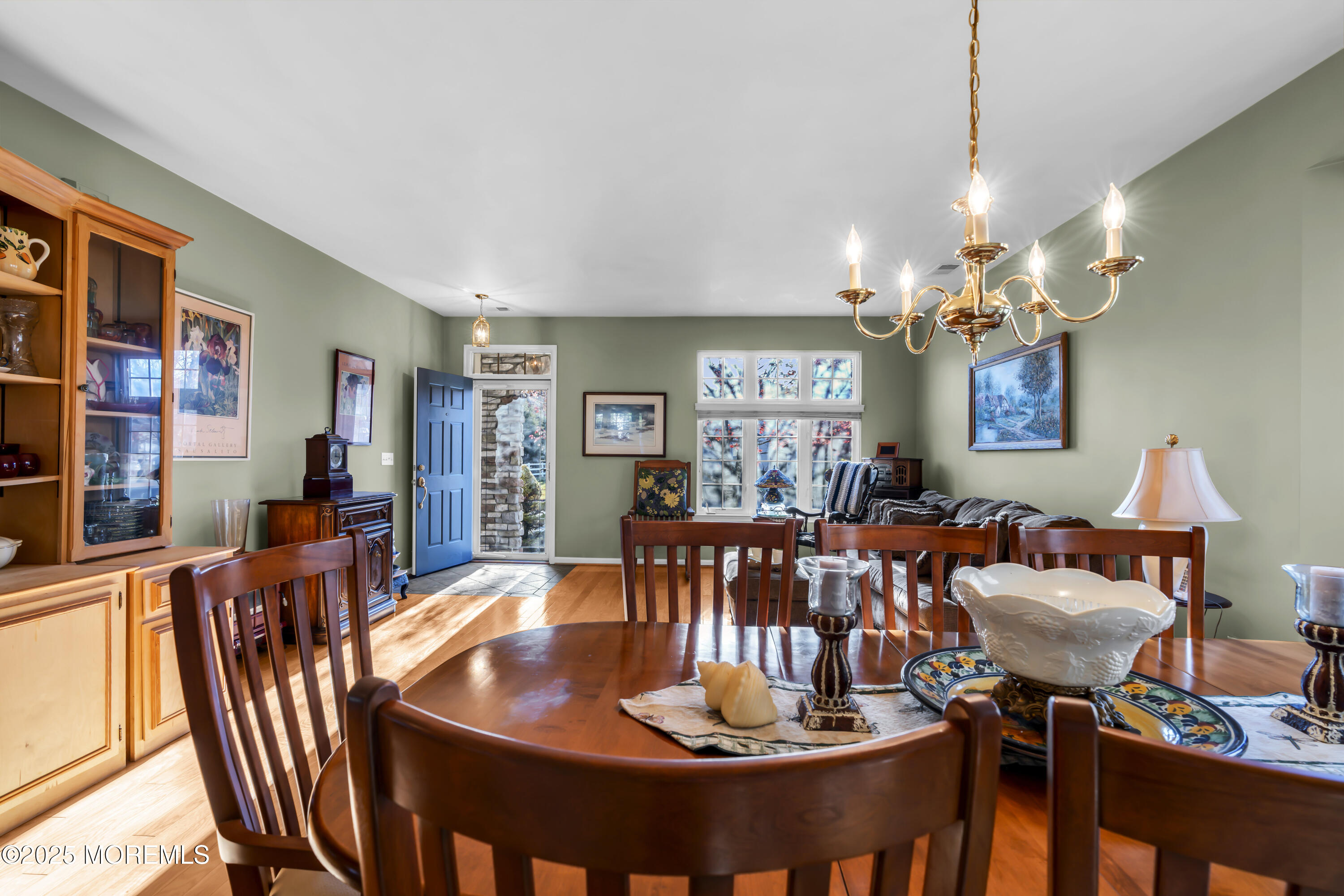 57 Hatteras Way Barnegat, NJ 08005 - Photo 13 of 60 a dining room with furniture a chandelier and window