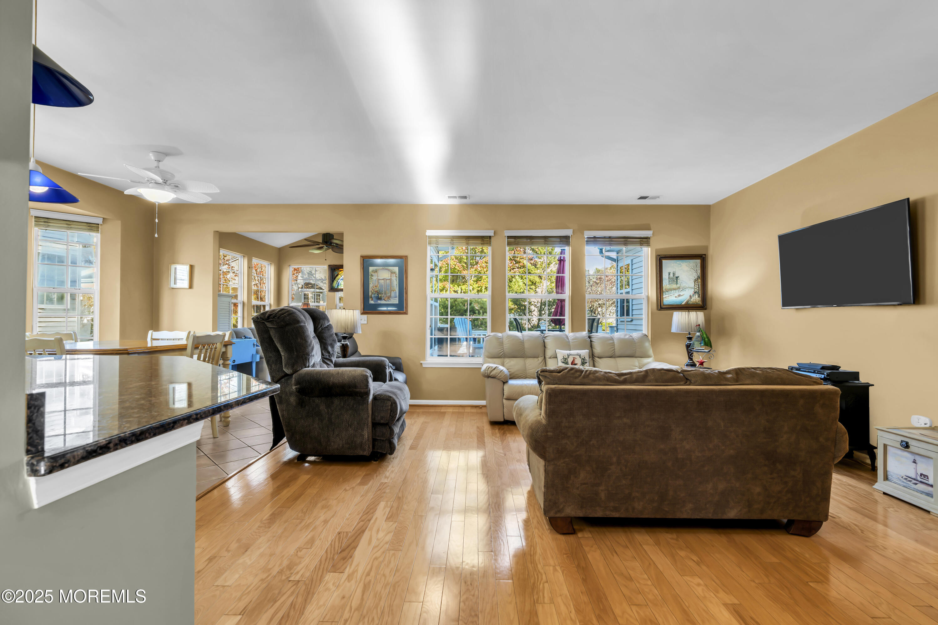 57 Hatteras Way Barnegat, NJ 08005 - Photo 18 of 60 a living room with furniture and a flat screen tv