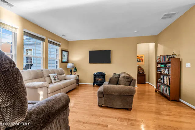 a spacious bathroom with a double vanity sink and a mirror
