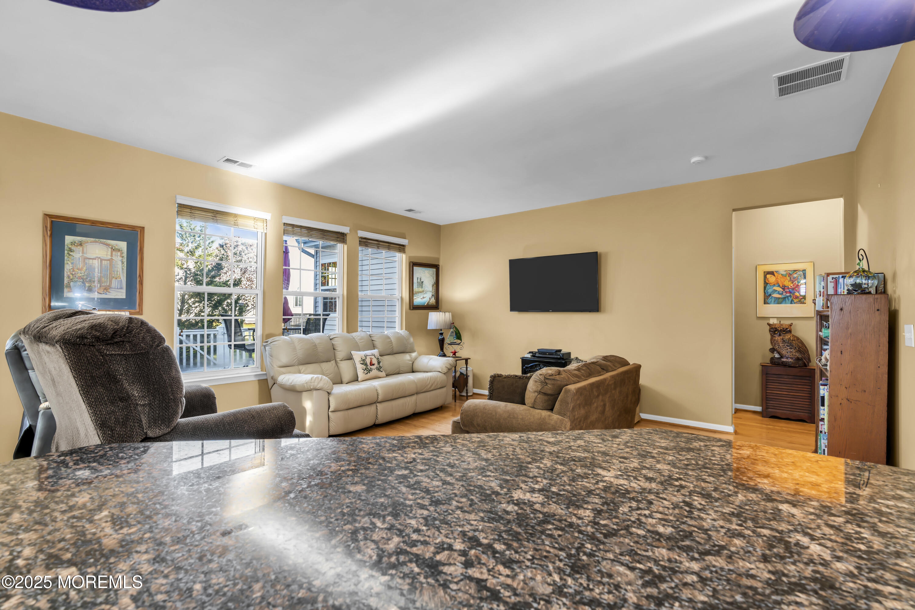 57 Hatteras Way Barnegat, NJ 08005 - Photo 35 of 60 a living room with furniture and a flat screen tv