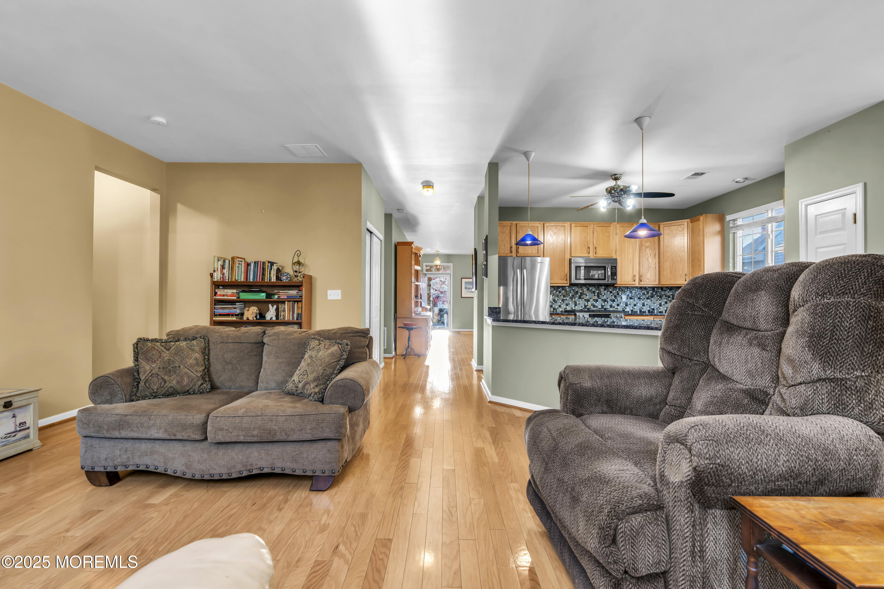 57 Hatteras Way Barnegat, NJ 08005 - Photo 36 of 60 a living room with furniture and a wooden floor