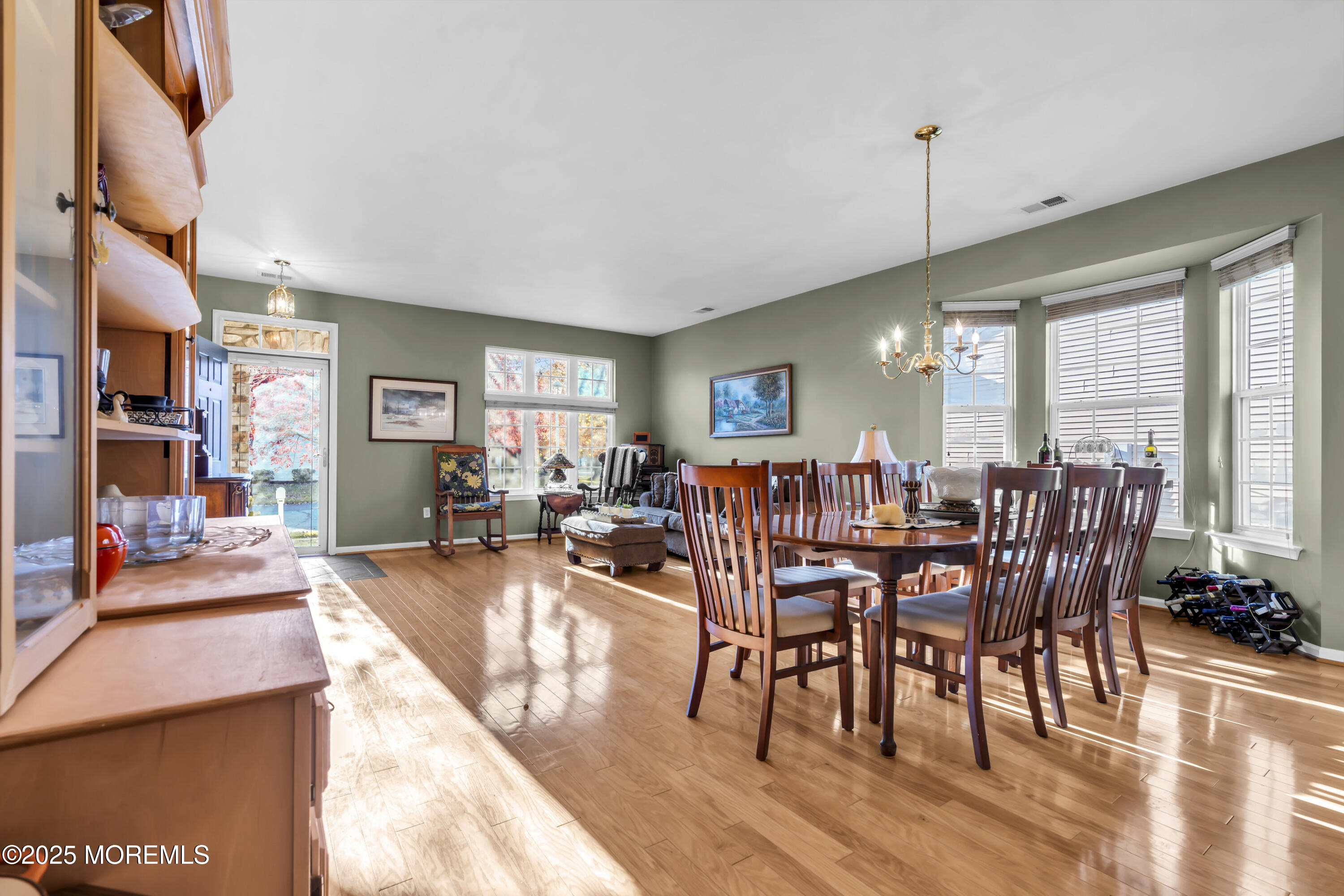 57 Hatteras Way Barnegat, NJ 08005 - Photo 53 of 60 a view of a dining room and livingroom with furniture wooden floor a chandelier