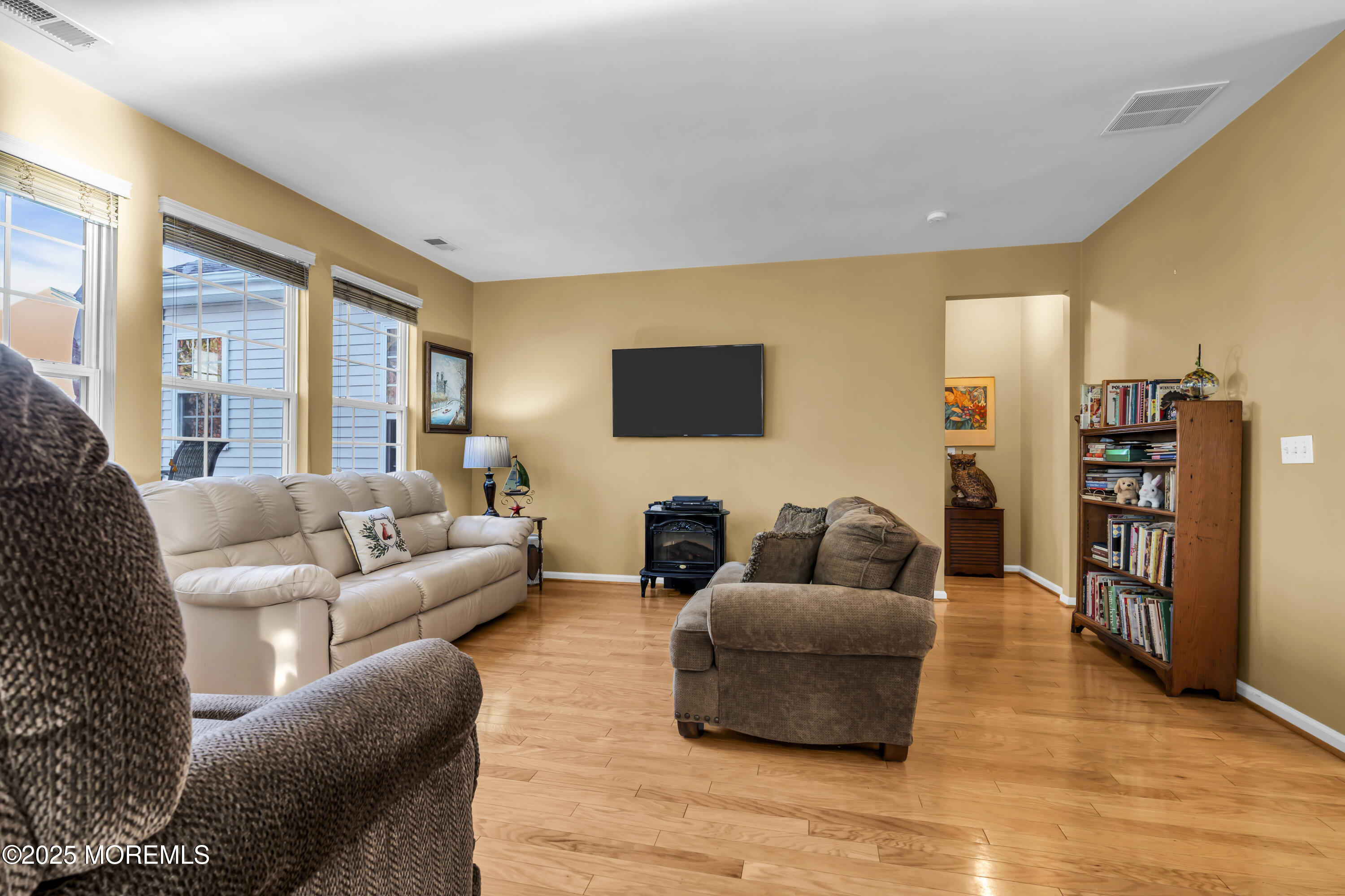57 Hatteras Way Barnegat, NJ 08005 - Photo 58 of 60 a living room with furniture and a flat screen tv