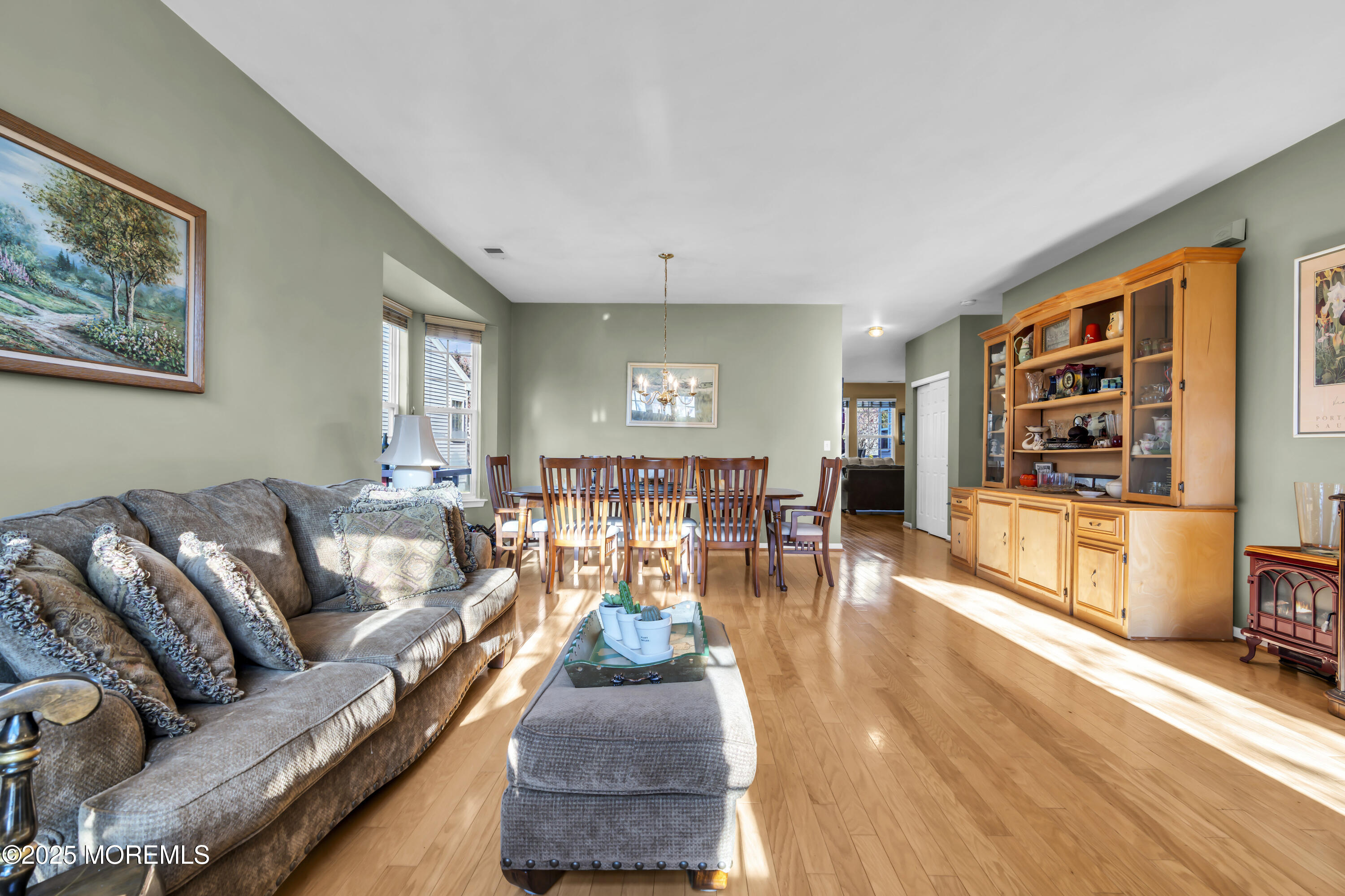 57 Hatteras Way Barnegat, NJ 08005 - Photo 8 of 60 a living room with furniture and a table