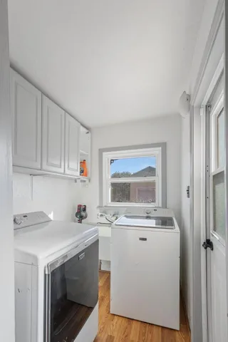 a utility room with washer and dryer