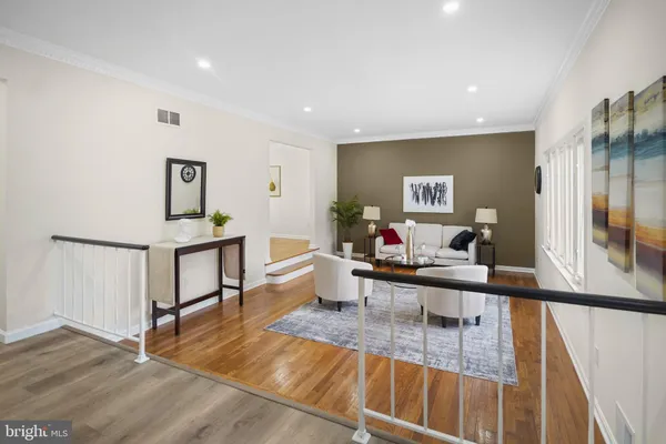 a view of a living room and dining room