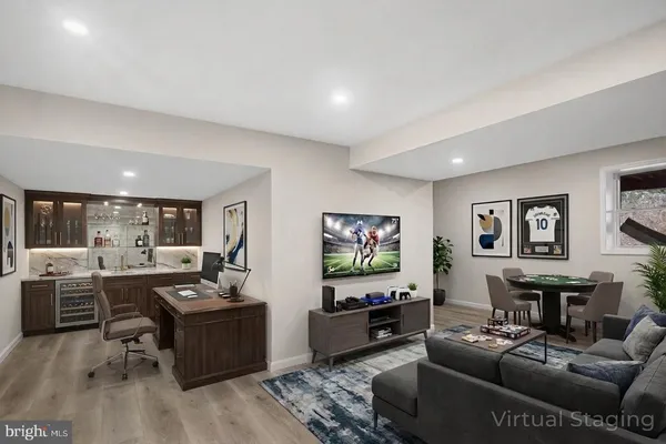 a living room with fireplace furniture and a flat screen tv