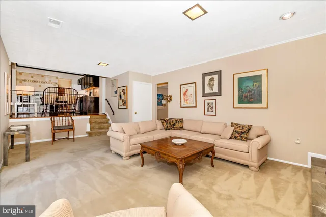 a living room with furniture and view of living room
