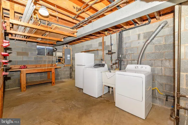 a view of a room with storage and utility room