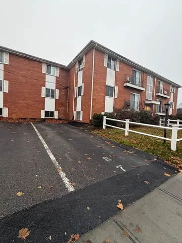a front view of a house with a garage