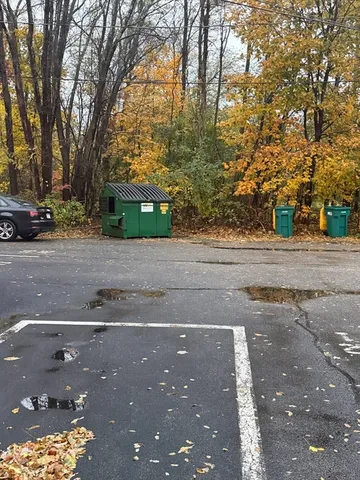 a view of a street with a building