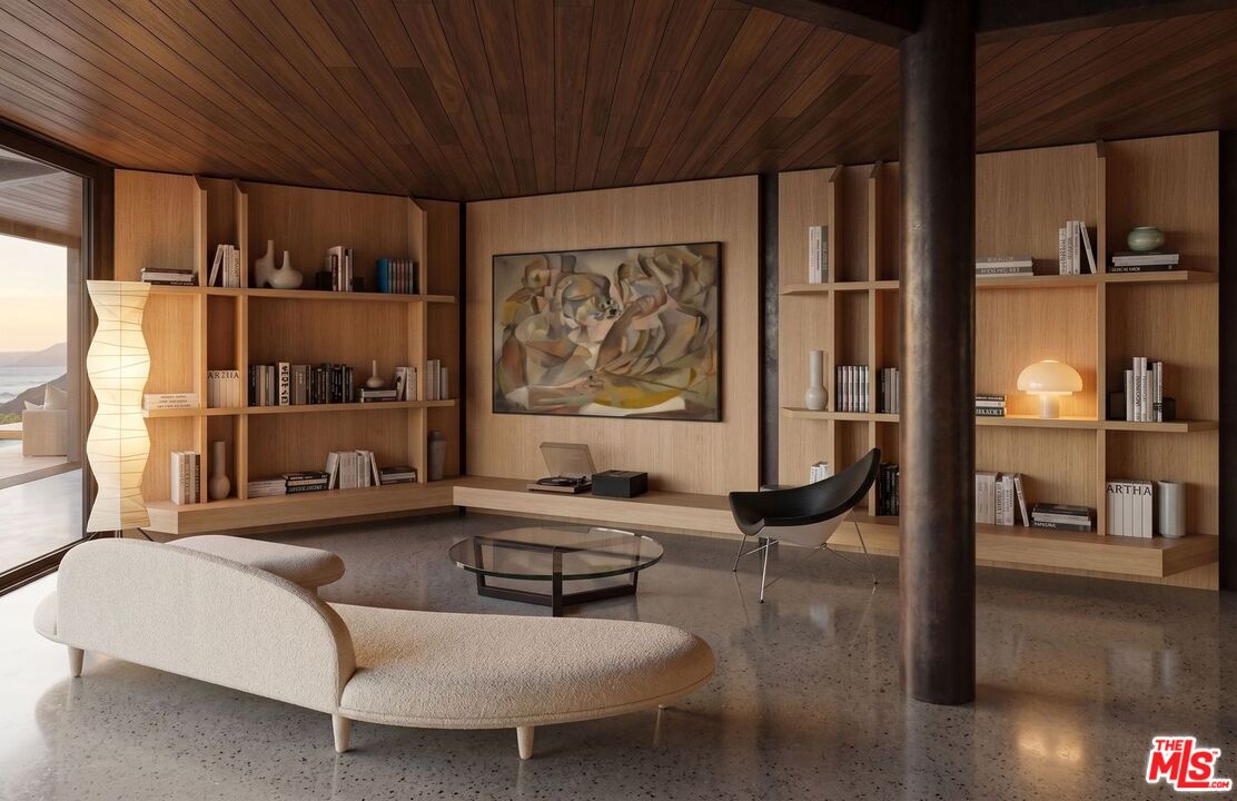 30000 Zenith Point Road Malibu, CA 90265 - Photo 14 of 15 a living room with furniture and large window with wooden floor