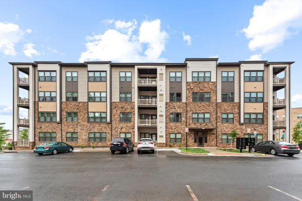 a view of a street with a balcony