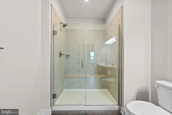 a view of a balcony with wooden floor