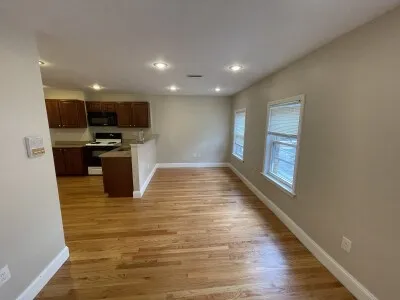 a view of kitchen with microwave oven and stove