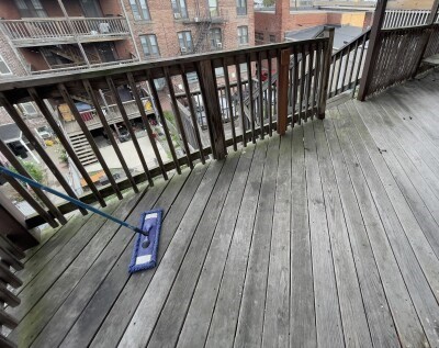 13 Pompeii Street, Unit 3 Boston, MA 02119 - Photo 9 of 9 a balcony with wooden floor