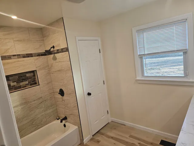 a bathroom with a bathtub