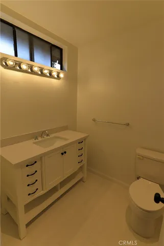 a bathroom with a sink and a toilet