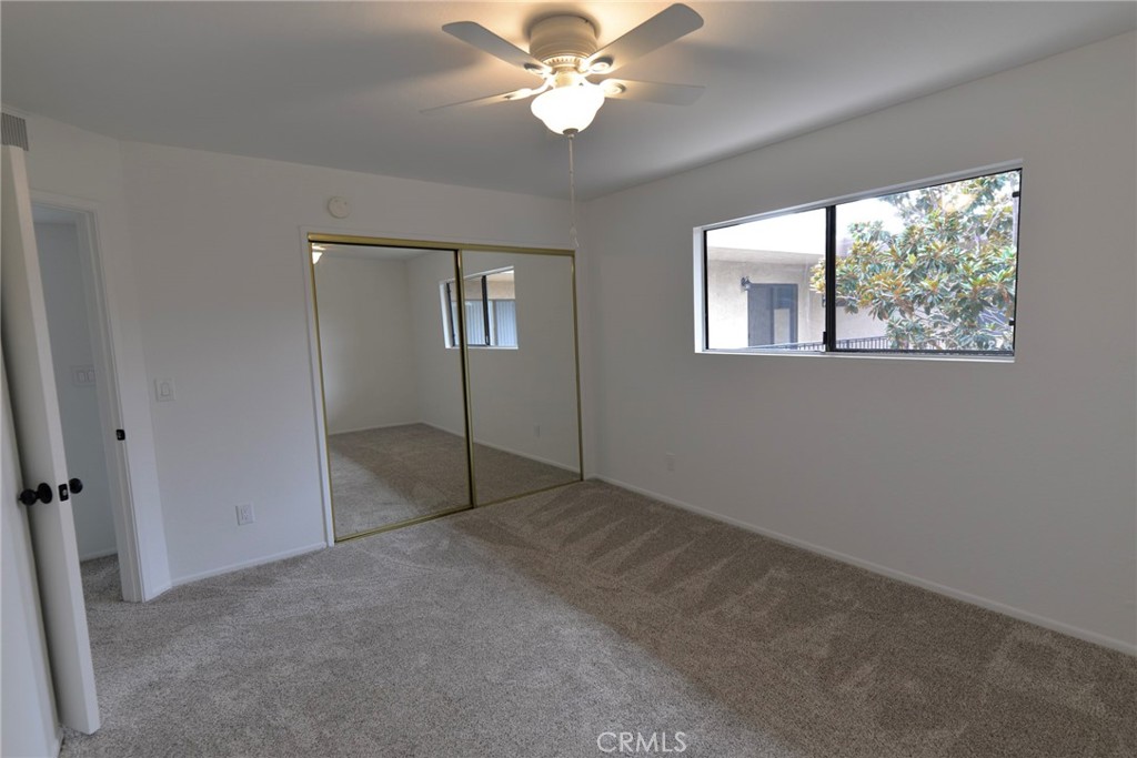 103 El Oriente, Unit 4 San Clemente, CA 92672 - Photo 14 of 19 a view of an empty room with a window