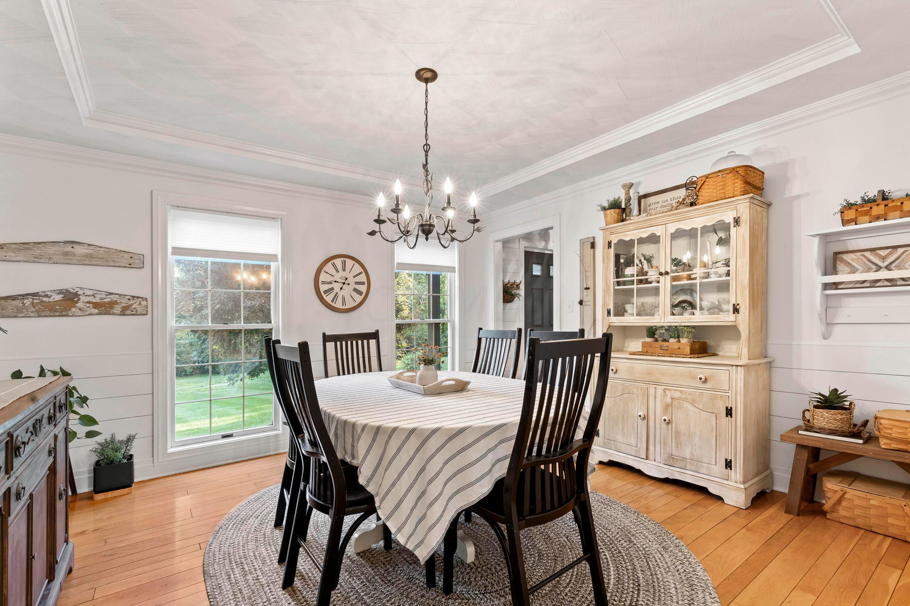 6262 Duffy Road Delaware, OH 43015 - Photo 11 of 96 • Hardwood flooring
• White painted &
shiplap walls
• Crown molding
• Chandelier