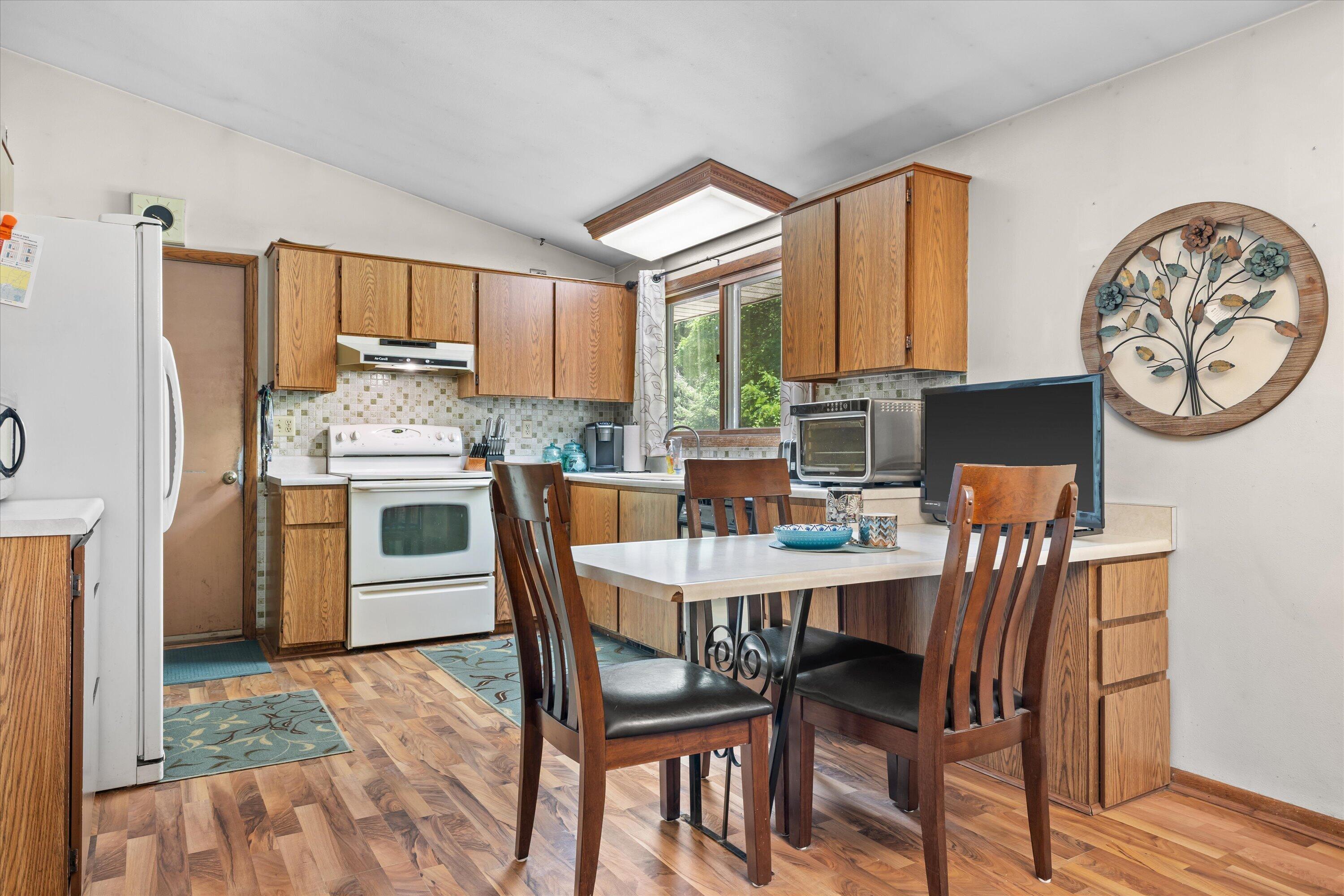 W347S7680 Sprague Road Eagle, WI 53119 - Photo 15 of 45 Large Kitchen With Laminate Floor