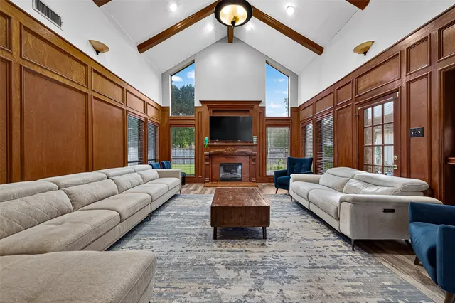 a living room with furniture and a couch