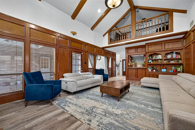 a kitchen with stainless steel appliances granite countertop a refrigerator and a stove