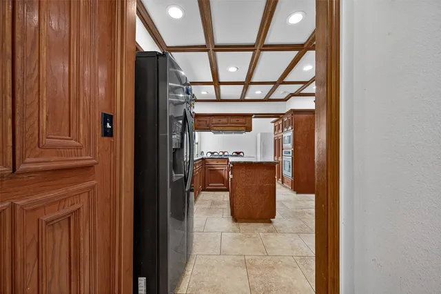 a living room with furniture a ceiling fan and a rug