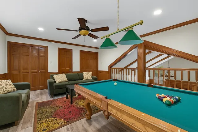 a kitchen with a refrigerator and a sink