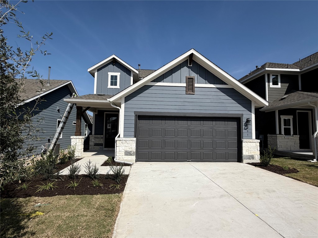 a front view of a house with yard