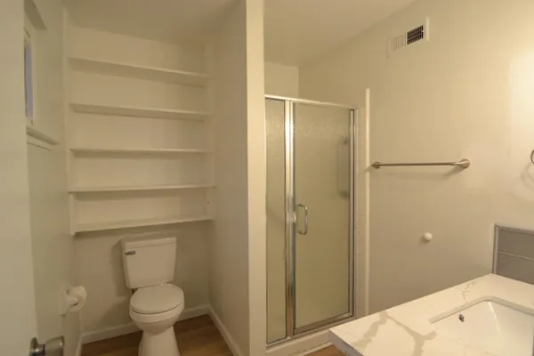 a bathroom with a sink and a toilet