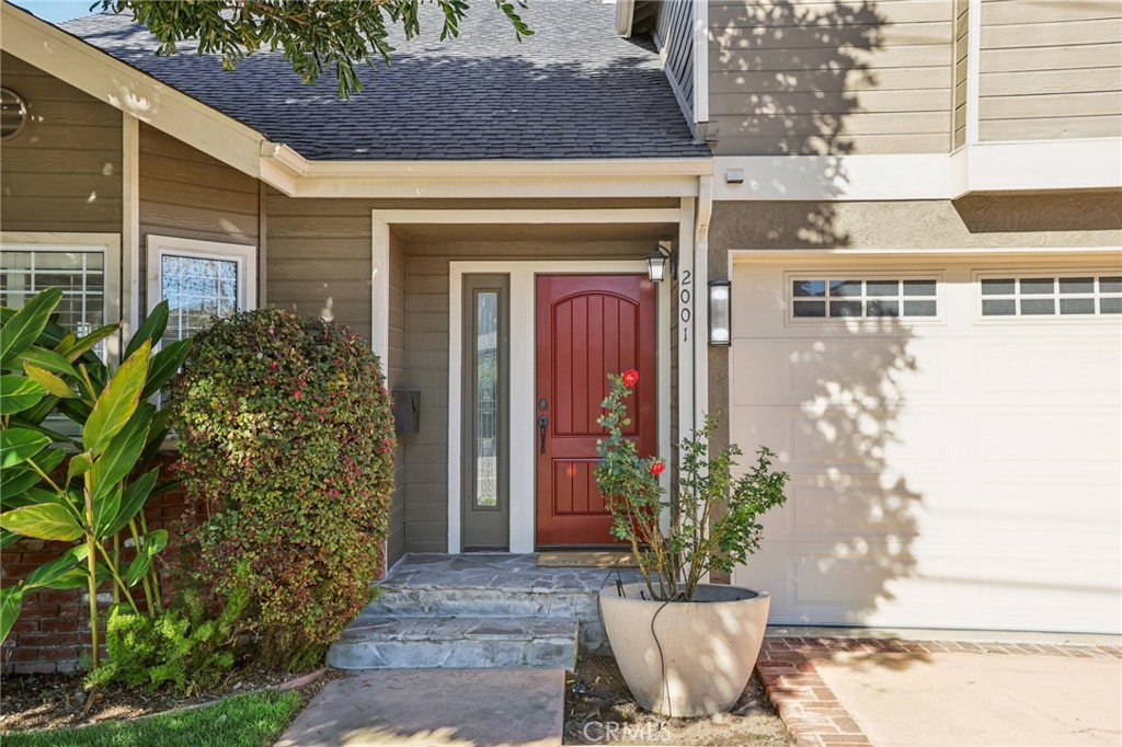 2001 Bataan Road Redondo Beach, CA 90278 - Photo 2 of 56 a view of a house with a potted plant