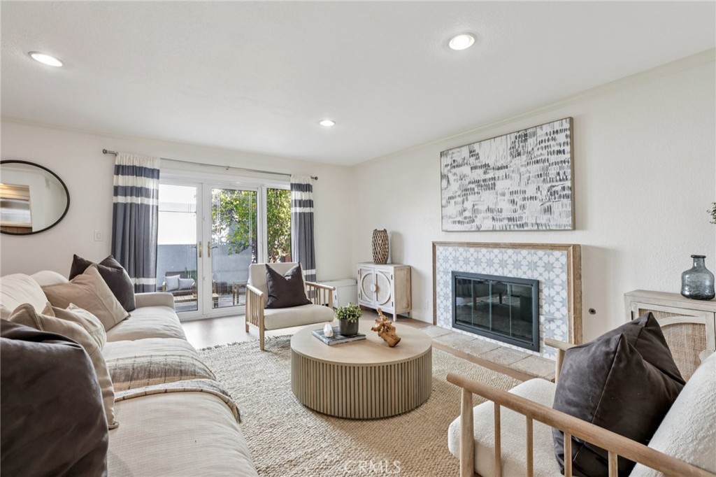 2001 Bataan Road Redondo Beach, CA 90278 - Photo 21 of 56 a living room with furniture and a fireplace