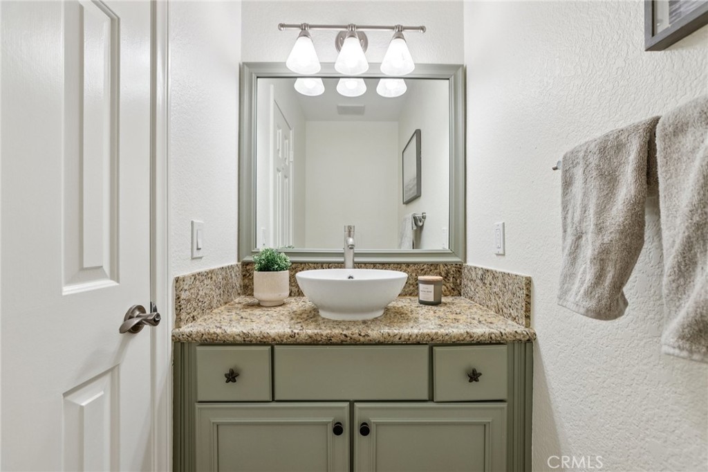 2001 Bataan Road Redondo Beach, CA 90278 - Photo 24 of 56 a bathroom with sink granite and mirror