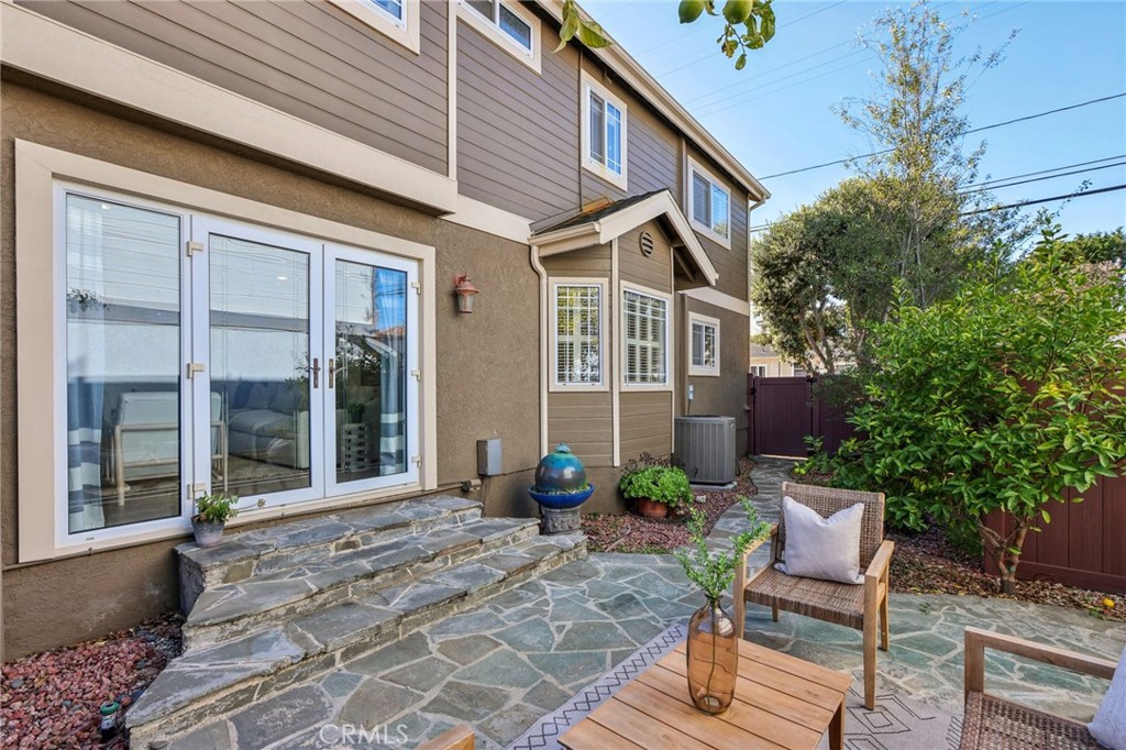 2001 Bataan Road Redondo Beach, CA 90278 - Photo 26 of 56 a view of a chair and table in backyard of the house