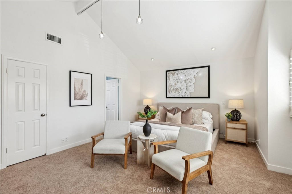 2001 Bataan Road Redondo Beach, CA 90278 - Photo 32 of 56 a living room with furniture and a painting on the wall